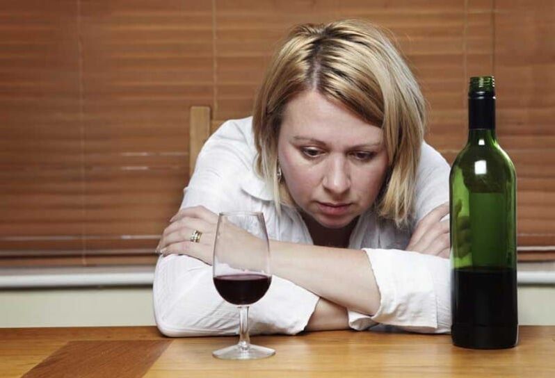 woman drinks wine how to quit